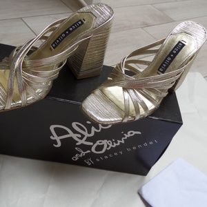 Alice and Olivia women  leather sandals in size: 6  (fit for size: 5 1/2 )